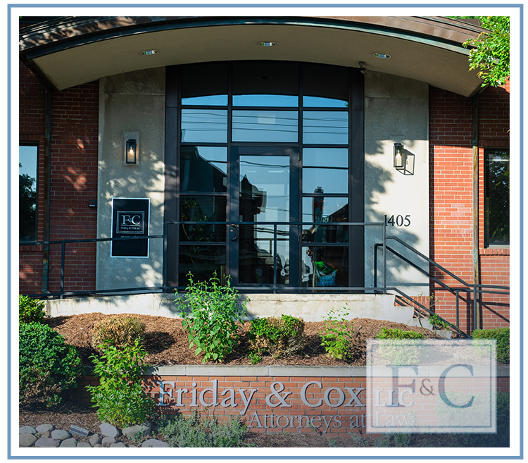 Entrance to the Friday & Cox LLC office at 1405 McFarland Road in Pittsburgh, with the firm sign visible