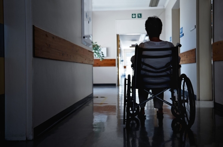 woman in a wheelchair in hospital